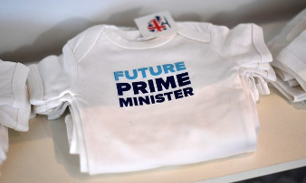 Baby T-shirts displayed for sale at 2016 Conservative party conference Carl Court Getty Images.jpg